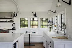 Black windows in the kitchen interior photo