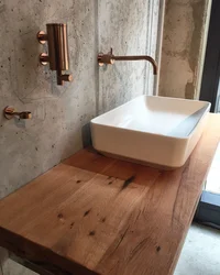 Bathtubs with wooden countertop photo