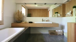 Bathtubs with wooden countertop photo