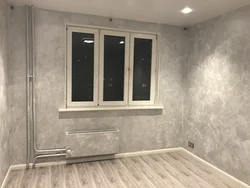 Gray plaster in the kitchen interior
