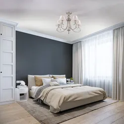 Дизайн светлой спальни с темной кроватью