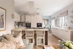Living room kitchen design in pastel colors