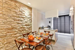 The entire kitchen is covered in stone wallpaper photo