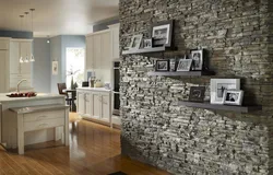 The entire kitchen is covered in stone wallpaper photo