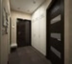 Photo of the hallway in an apartment with dark doors