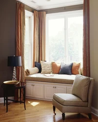 Sofa by the window in the bedroom design