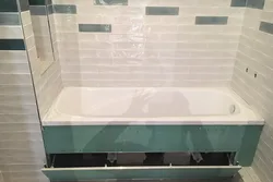 Hidden hatch for bathtub photo