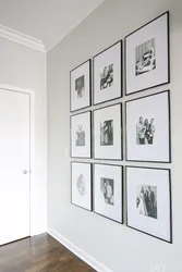 Frames With Photos On The Wall In The Hallway