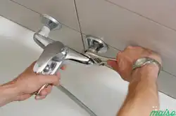 Photo Of Installed Faucets In The Bathroom