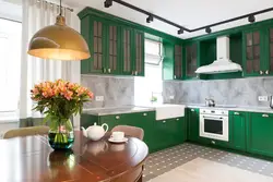 Dark green kitchen in the interior