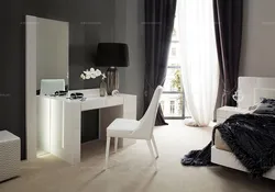 Photo of a bedroom with a table