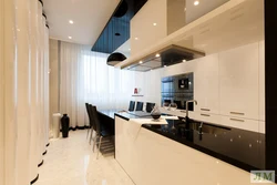 Black beige kitchen in the interior photo