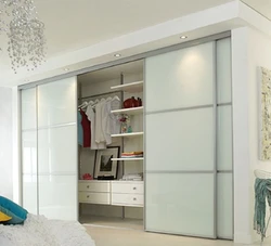 Wardrobe in the ceiling in the bedroom photo