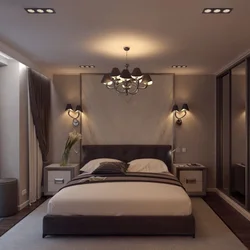 Lamps above the bed in the bedroom interior photo