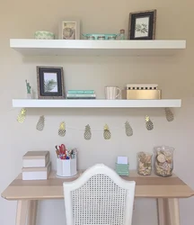 Shelves above the table in the kitchen interior photo