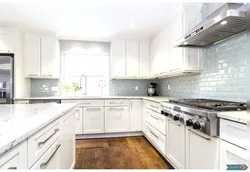 Light gray countertop in the kitchen interior