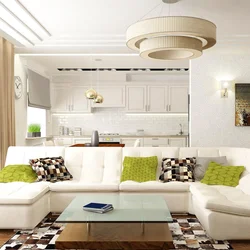 Kitchen living room design with sofa in the middle