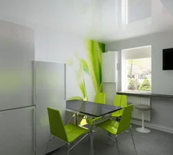 Green Chairs In The Interior Of A White Kitchen