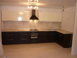Kitchens with dark countertops and dark bottom photo