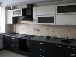 Kitchens with dark countertops and dark bottom photo