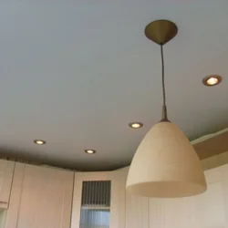 Фото одноуровневых натяжных потолков для кухни