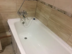 Installation Of A Bathtub In The Bathroom Photo