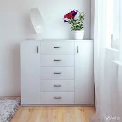 Chest of drawers in a small bedroom photo