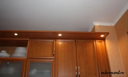 Kitchens with canopy and lighting photo