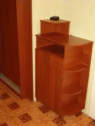 Cabinet in a small hallway photo